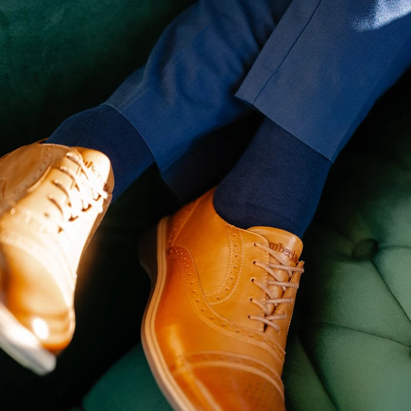 close up detail photos of Amberjack Dress Socks in Cobalt paired with The CapToe Honey