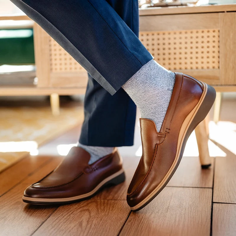 close up detail photos of Amberjack Dress Socks in Ocean paired with The Slip-On Chestnut and navy dress pants