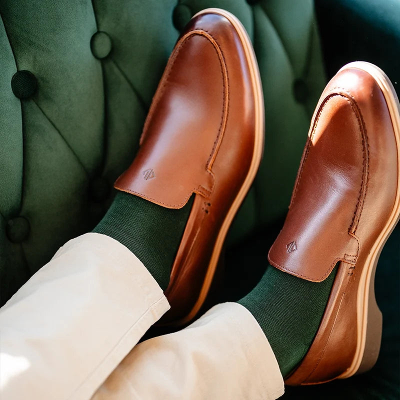 close up detail photos of Amberjack Dress Socks in Olive paired with The Loafer Chestnut and light dress pants
