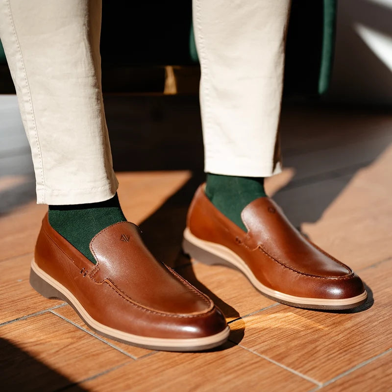 close up detail photos of Amberjack Dress Socks in Olive paired with The Loafer Chestnut and khaki pants