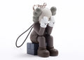 KAWS Passing Through Keychain Brown