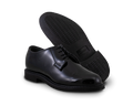 2 black gloss leather shoes sit beside each other showing sole and top of shoe