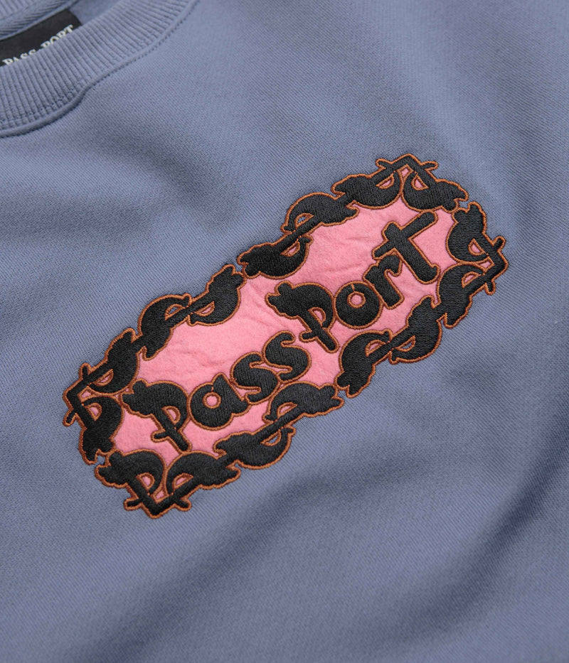 Pass Port Pattoned Crewneck Sweatshirt in Washed Out Blue