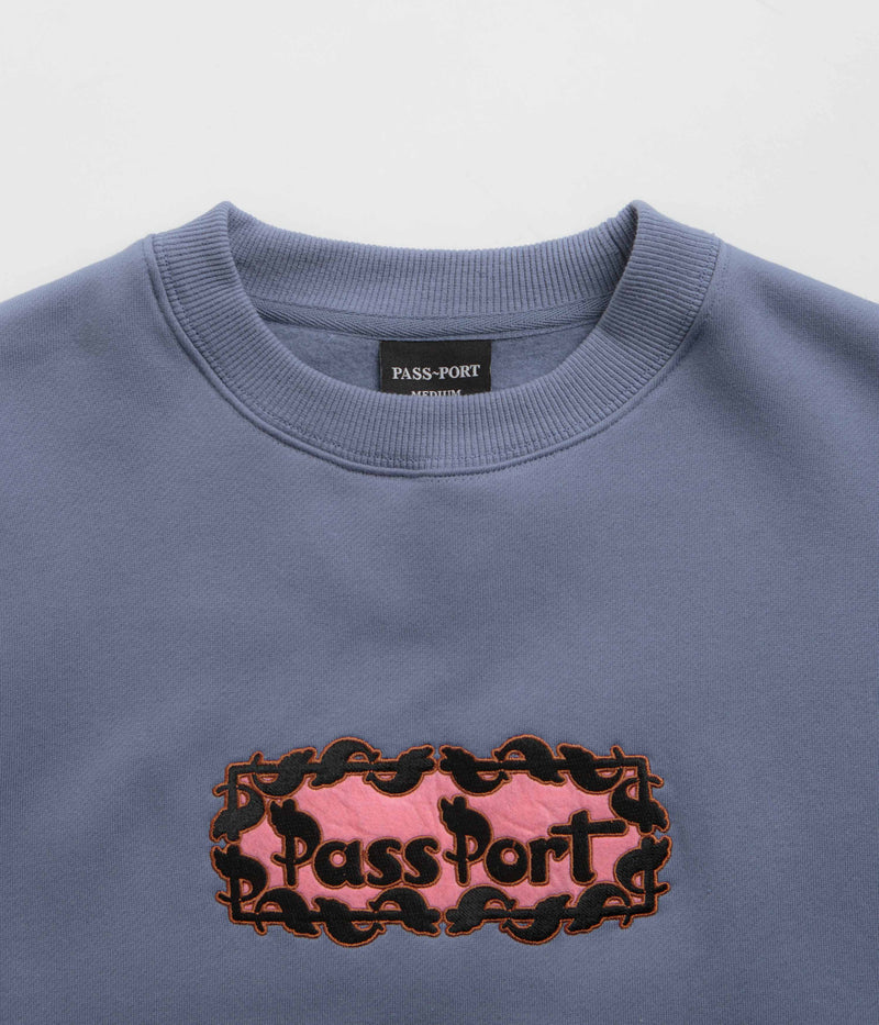 Pass Port Pattoned Crewneck Sweatshirt in Washed Out Blue