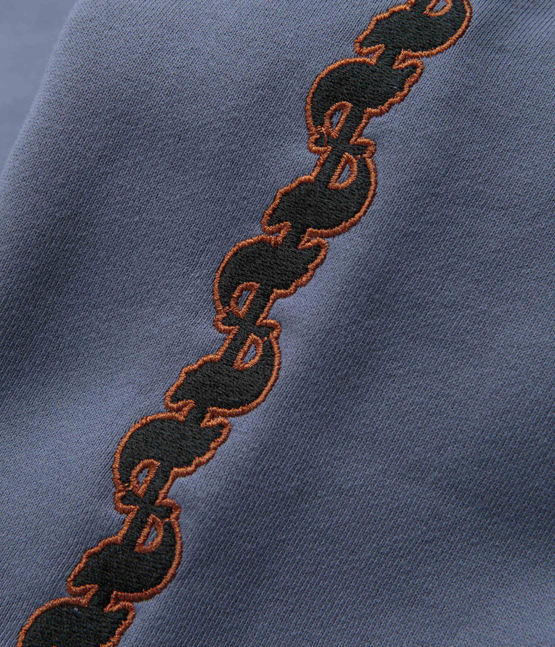 Pass Port Pattoned Crewneck Sweatshirt in Washed Out Blue