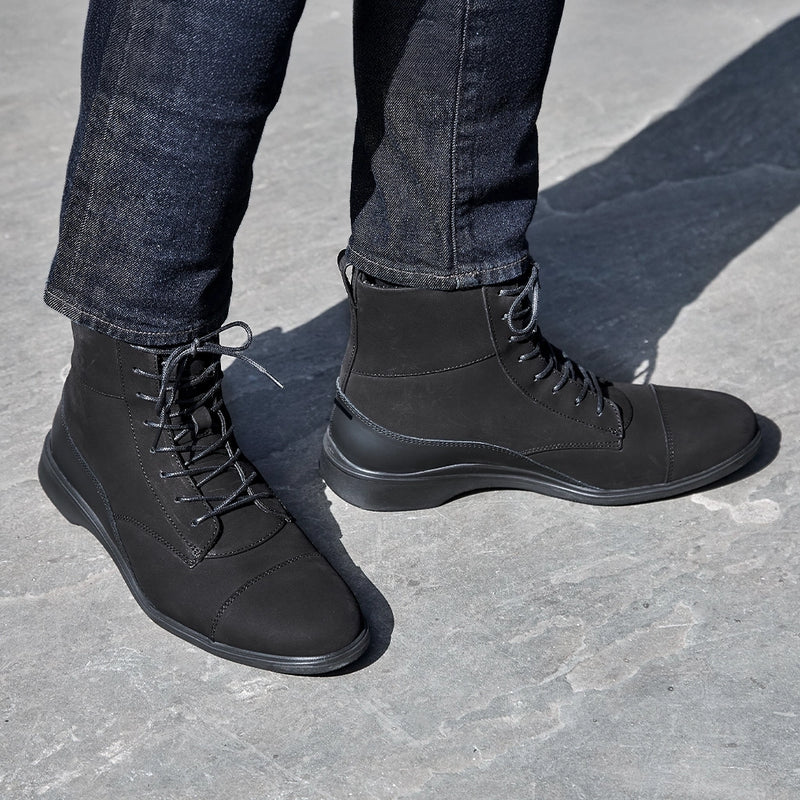 model wearing the boot midnight dark jeans