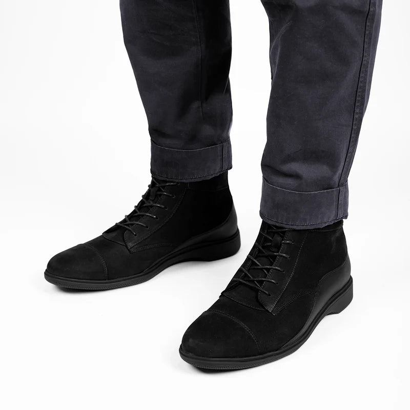 The Boot in Midnight by Amberjack - close up of boots on model wearing black dress pants