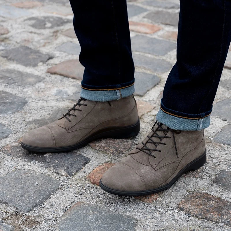 model wearing The Boot in Steel gray Nubuck