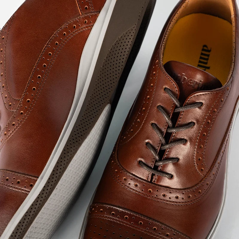 Detail photo of The Cap-Toe in Coffee Brown Leather showing broguing and laces