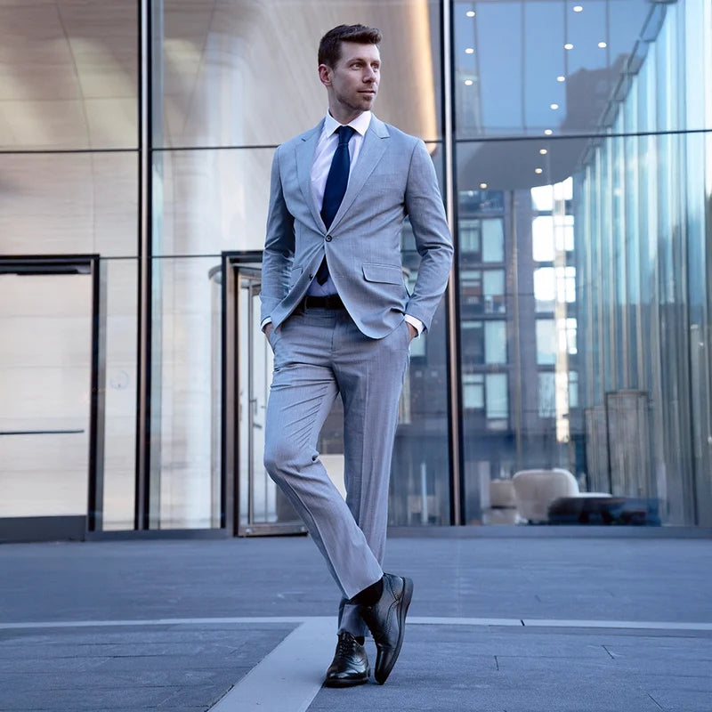 The Cap-Toe in Obsidian Black Leather worn by model outside