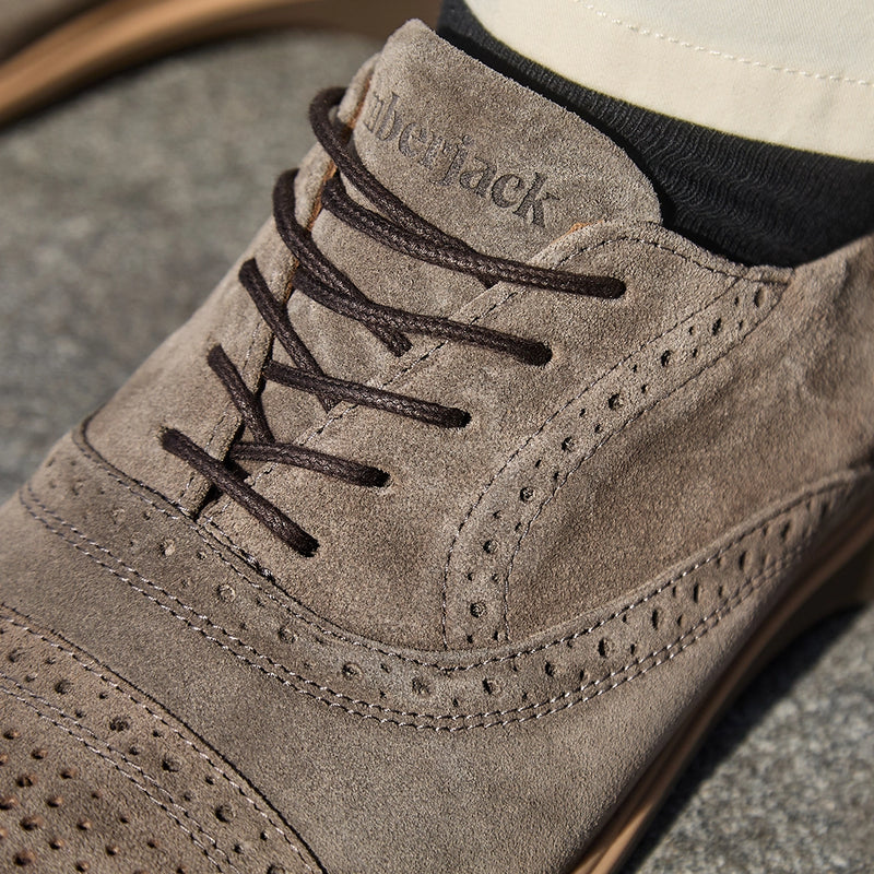 The Cap-Toe Slate close up detail photo of Italian suede and sheepskin lining