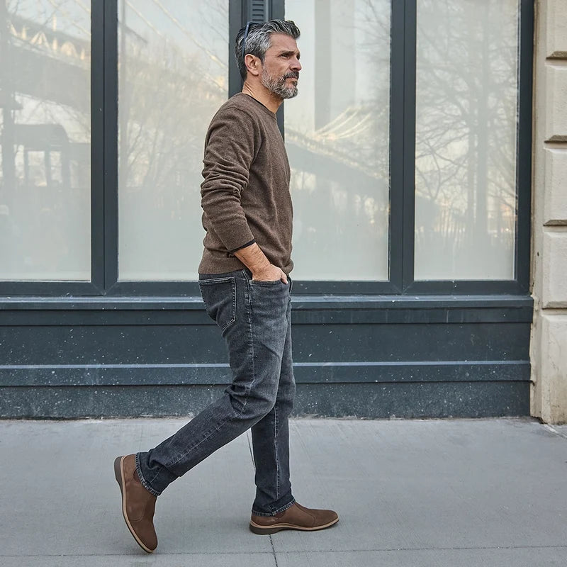 model walking wearing the chelsea copper paired with dark jeans and sweater