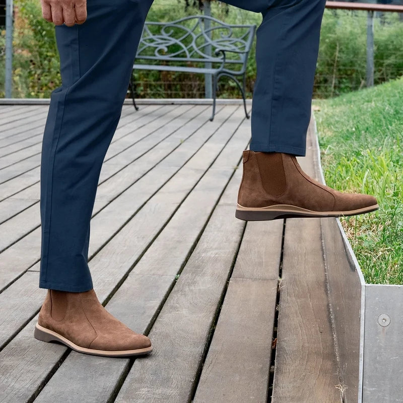 model wearing the chelsea copper paired with navy dress pants