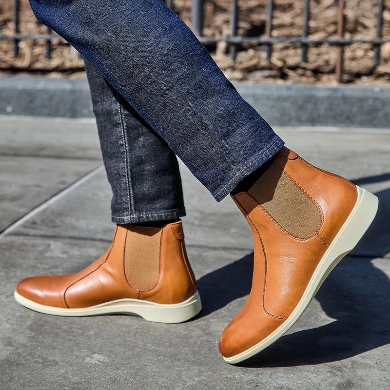 model wearing the chelsea honey and cream with dark jeans - side view