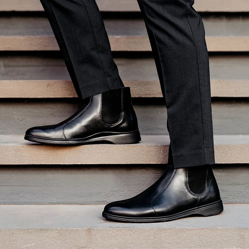 The Chelsea Boot by Amberjack in Obsidian Black Leather - Worn with dark grey dress pants