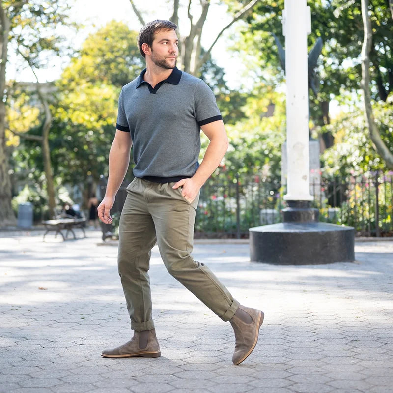 The Chelsea Boot by Amberjack in Slate Grey Suede - on model wearing green pants and blue polo