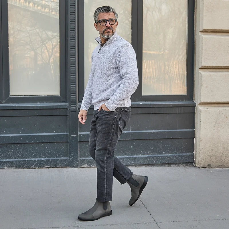 Model wearing The Chelsea Steel paired with dark jeans and gray sweater