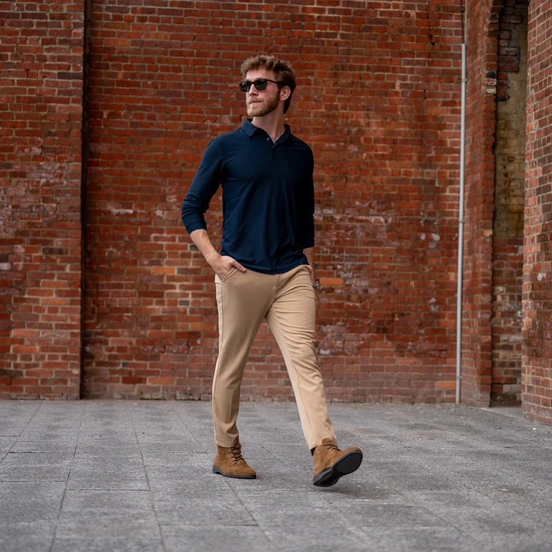 Chukka Grizzly on model with khaki pants and blue long sleeve polo shirt
