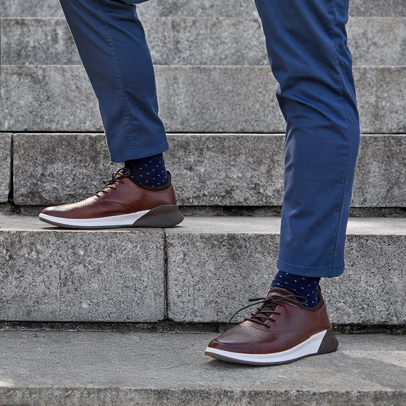 The Hybrid in Chestnut Brown Leather - on model wearing dark dress pants