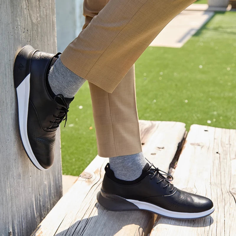 The Hybrid  in Obsidian Black by Amberjack - on model wearing khakis