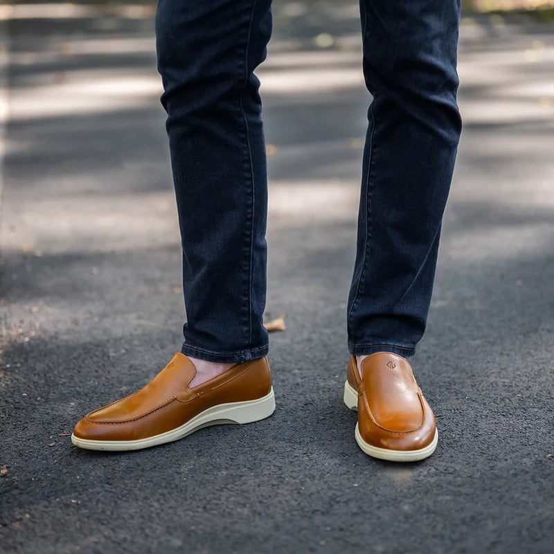 The Loafer by Amberjack in Honey & Cream Tan Leather - On model wearing blue jeans