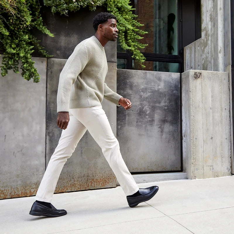 The Loafer by Amberjack in Obsidian Black Leather - Worn with cream pants
