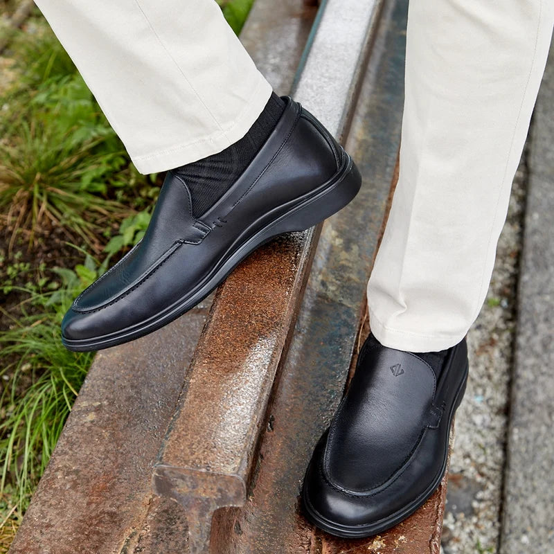 The Loafer by Amberjack in Obsidian Black Leather - Worn with cream pants