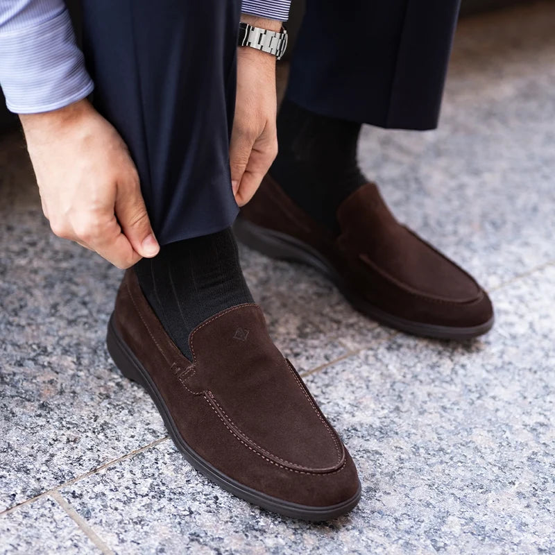 Model wearing The Loafer by Amberjack in Walnut brown suede - with dark blue dress pants