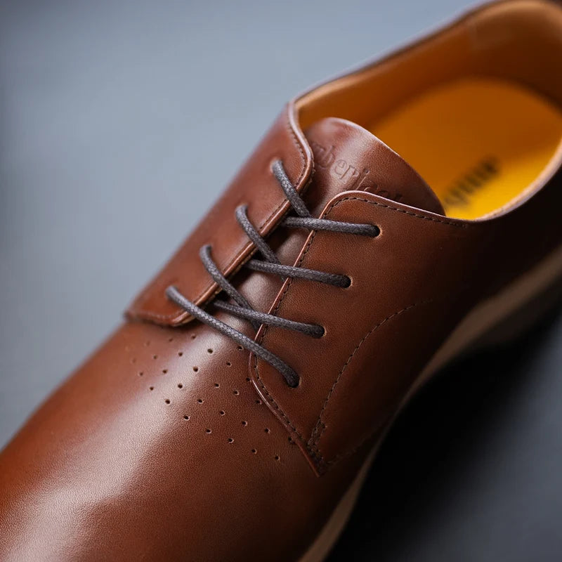 Close up detail photo of The Original Chestnut brown leather and shoe laces