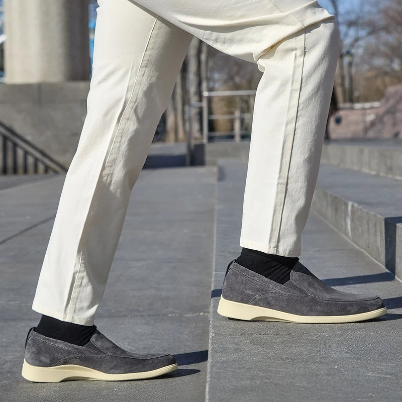 Model wearing The Slip-On Carbon paired with light khaki pants