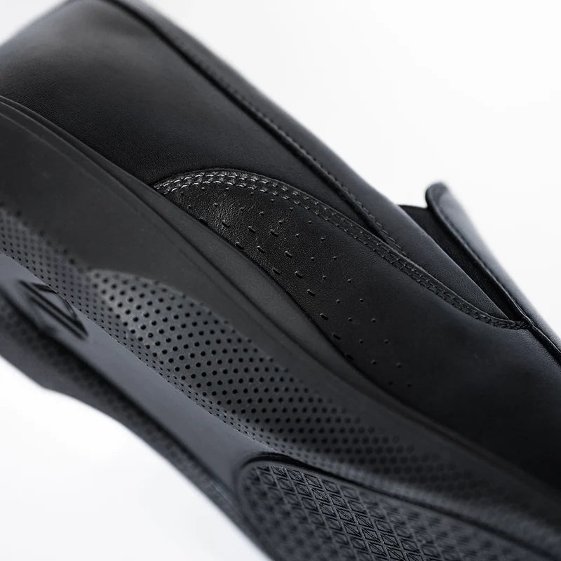 The Slip-On by Amberjack in Obsidian Black Leather - Leather detail image