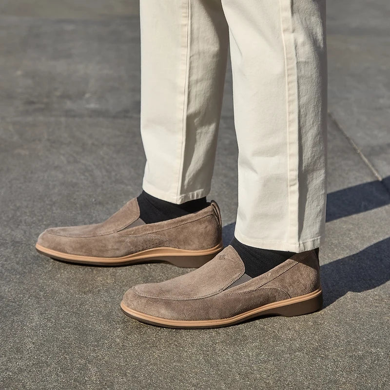 Model wearing The Slip-On Slate paired with light khakis