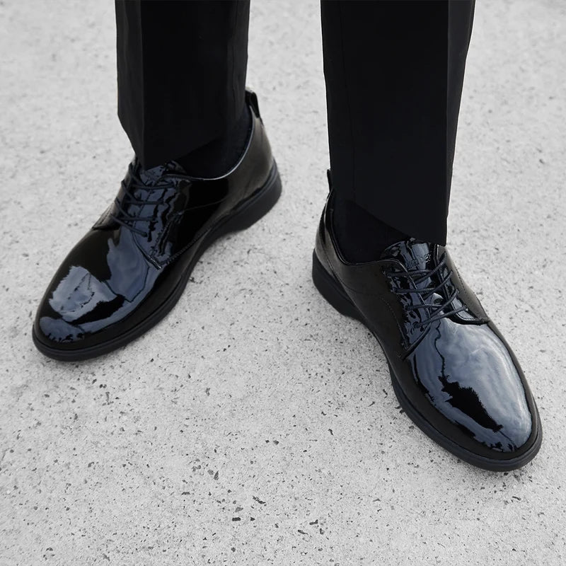 model wearing a Tuxedo with The Tux by Amberjack in Obsidian black patent leather